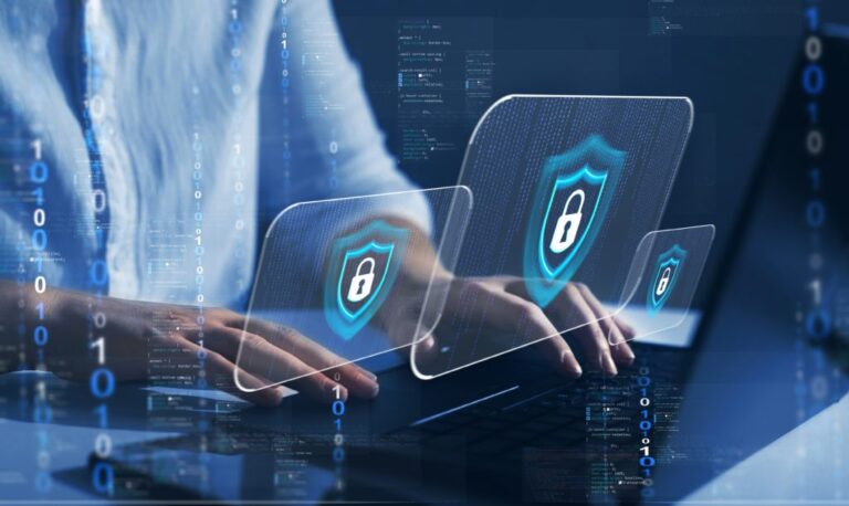 A person typing on a laptop with digital lock icons and binary code overlay, symbolising cybersecurity and data protection.